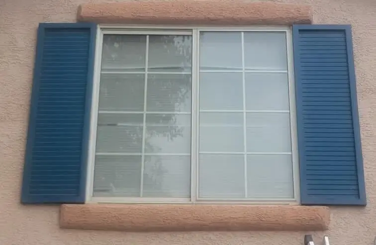 Window replacement & trim — Retrofit window replacement with new stucco surround, shutters, and exterior sealing.